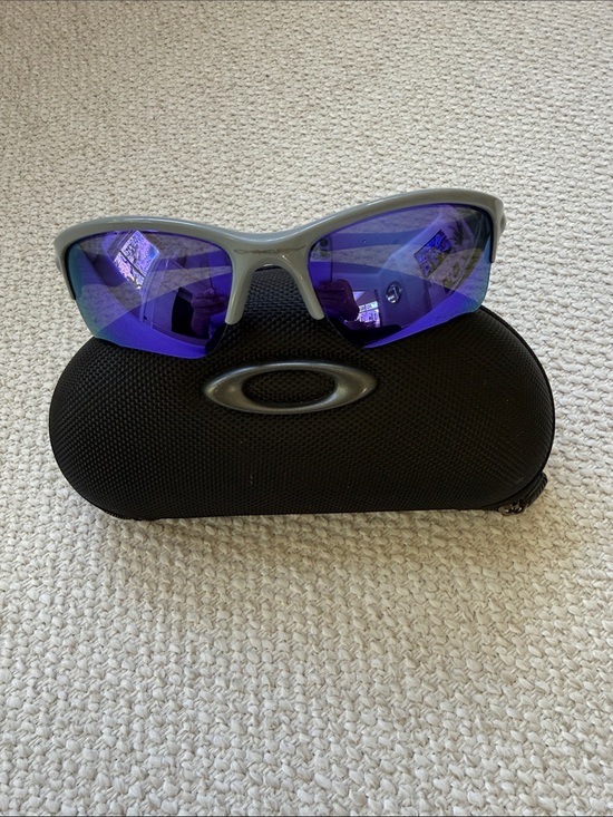 Oakley Accessories - Oakley Gray Frame Sunglasses with Blue Mirrored Lenses